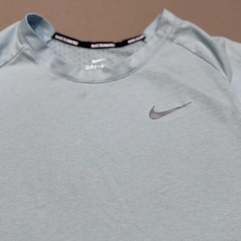 Nike Women's Light Blue Dri-Fit Short Sleeve Tee